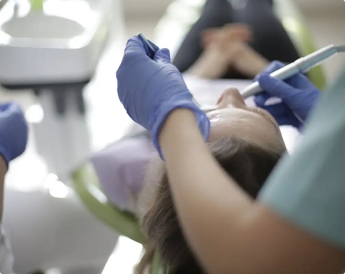Dentist explaining dental implants to patient