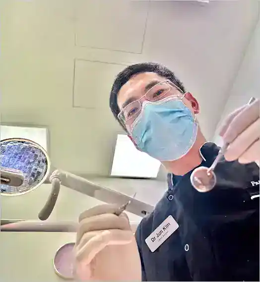 Dentist preparing for a procedure.